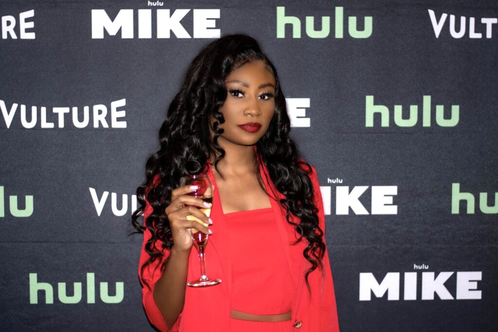 Remi Jones of Remi TV Nation  attends the red carpet premiere of "Mike" on Hulu X Vulture 